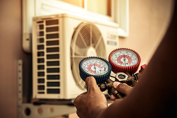 Professional Hvac technician working in Spraggs, PA